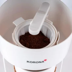 KORONA Kaffee To Go Kaffeemaschine Braun/Weiß Mit Becher -Kaffeegenuss Verkaufsgeschäft 0b82be6cea018b4239843dee11650454
